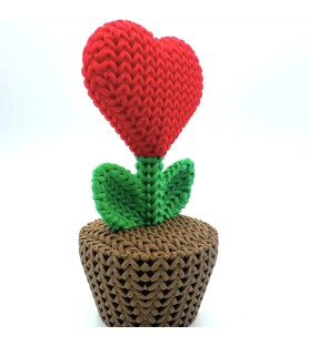 Plante au cœur rouge, décoration tricotée