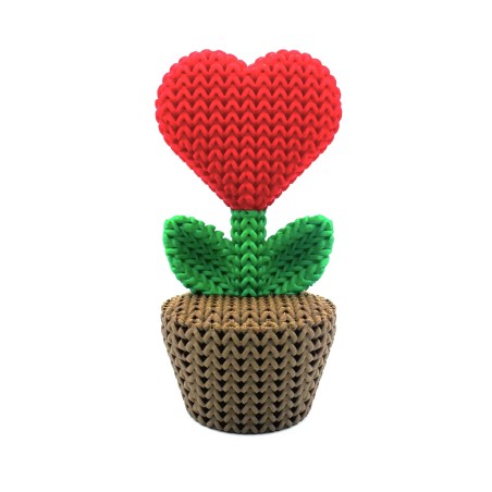Plante au cœur rouge, décoration tricotée