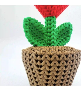 Plante au cœur rouge, décoration tricotée