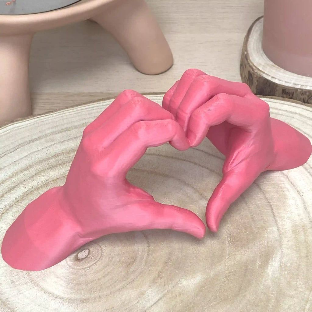 Les mains en cœur